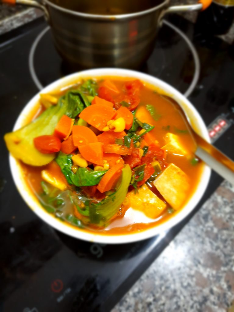 Tofu tomato noodle soup